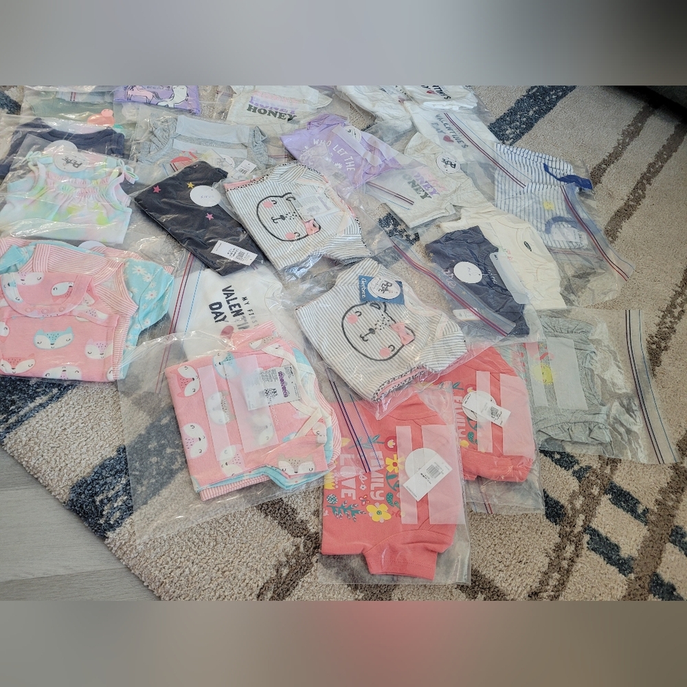 Lot of NB and 0-3 month baby girl. Nwt